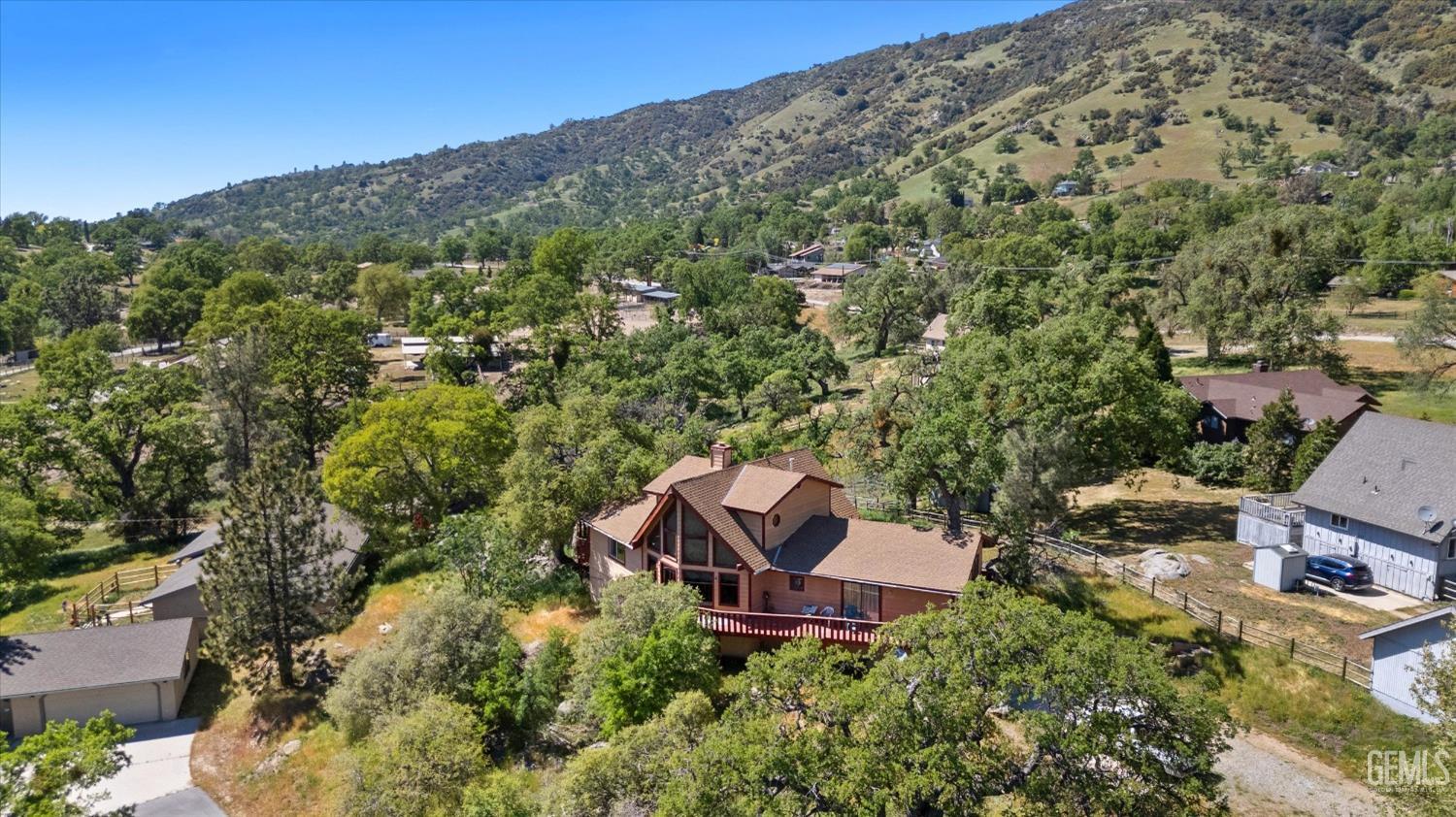 Undisclosed Address Tehachapi, CA 93561 - Photo 4 of 16 a view of a house with a yard