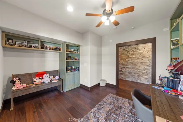 a room with a sink and a mirror