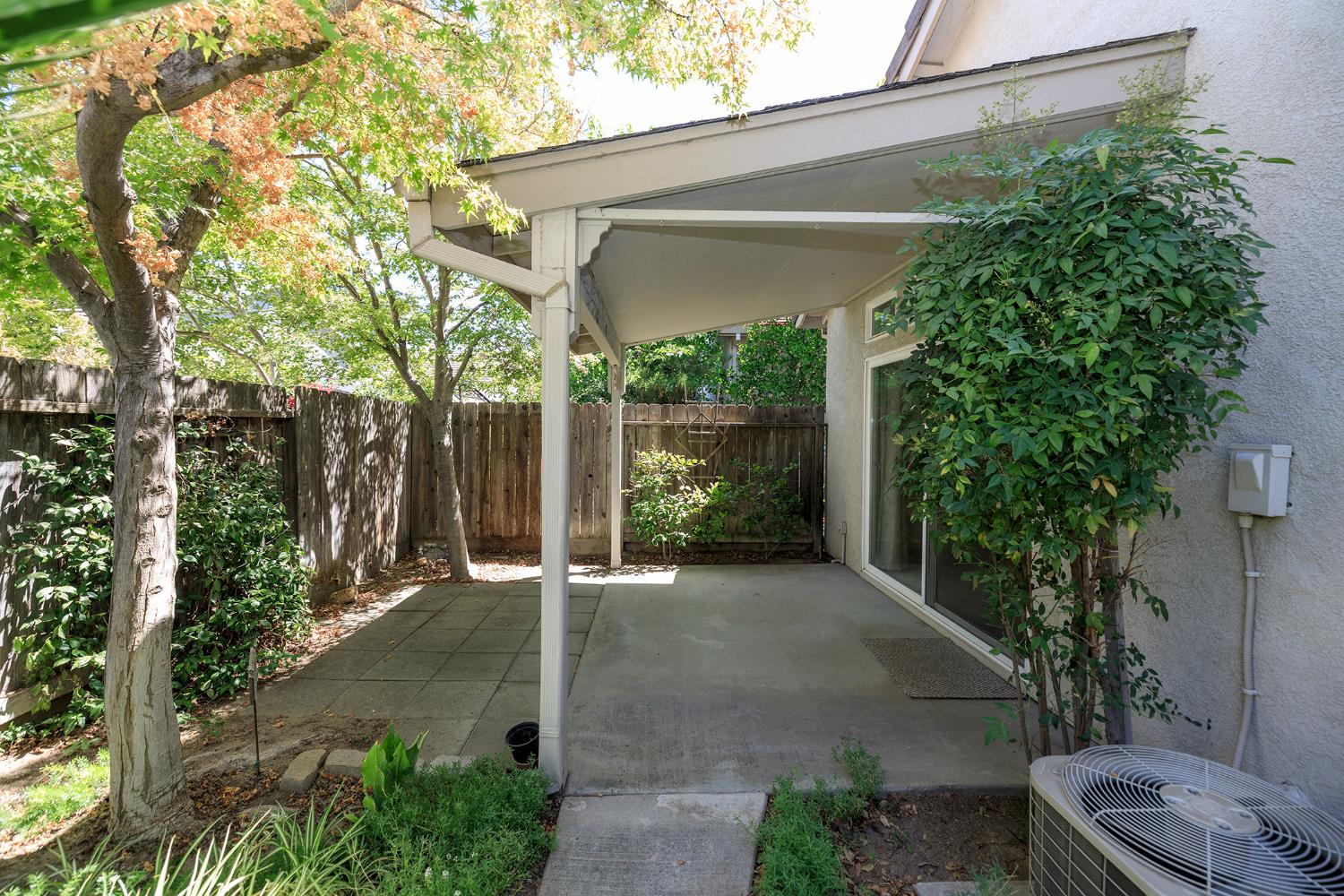 2123 Spring Blossom Lane Turlock, CA 95382 - Photo 28 of 44 a view of a backyard with garden