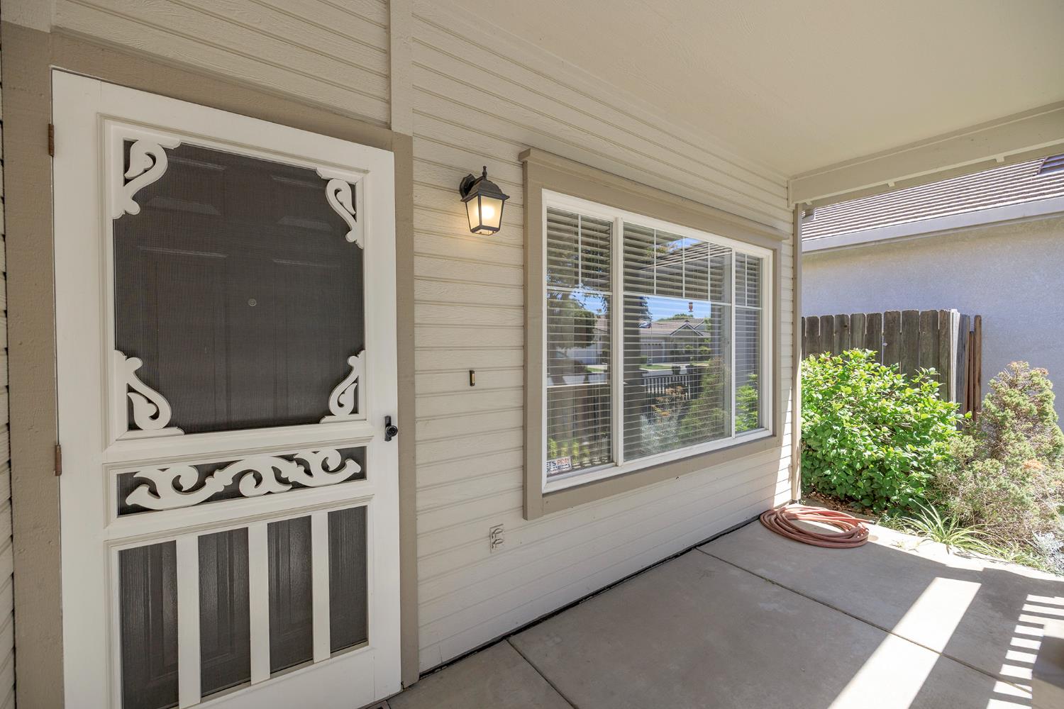 2123 Spring Blossom Lane Turlock, CA 95382 - Photo 4 of 44 a view of a entryway door of the house