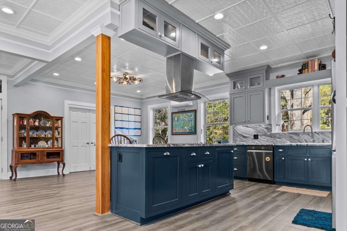 140 Jack Road Fitzgerald, GA 31750 - Photo 11 of 55 a kitchen with stainless steel appliances granite countertop a sink and cabinets