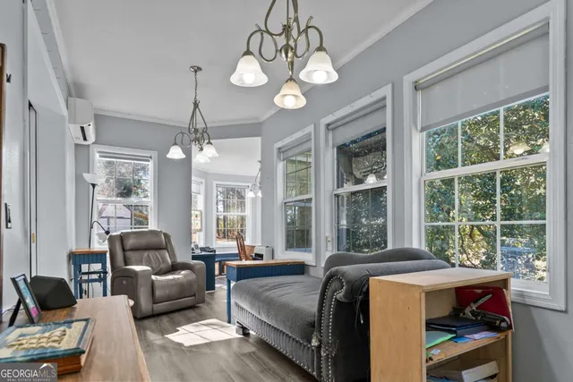 a bathroom with a granite countertop sink a large mirror and a shower