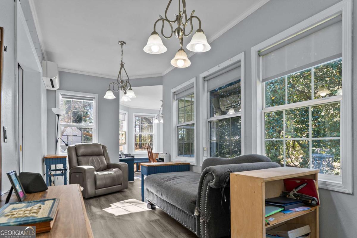 140 Jack Road Fitzgerald, GA 31750 - Photo 24 of 55 a living room with furniture and a large window