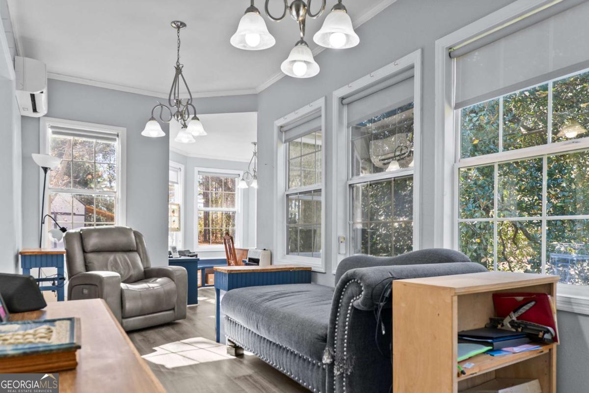 140 Jack Road Fitzgerald, GA 31750 - Photo 25 of 55 a living room with furniture and a large window