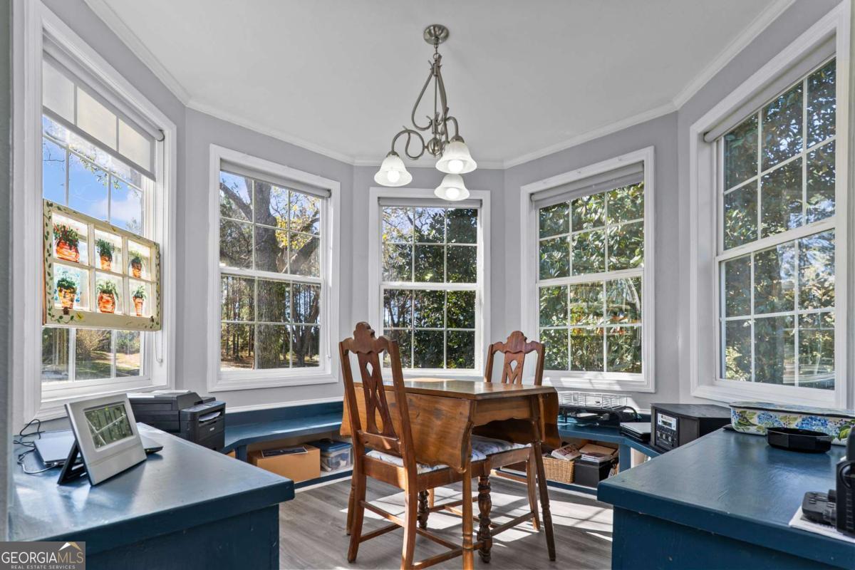140 Jack Road Fitzgerald, GA 31750 - Photo 26 of 55 a view of a dining room with furniture window and outside view
