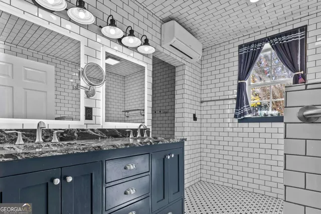 a bathroom with a blue white checkered floor