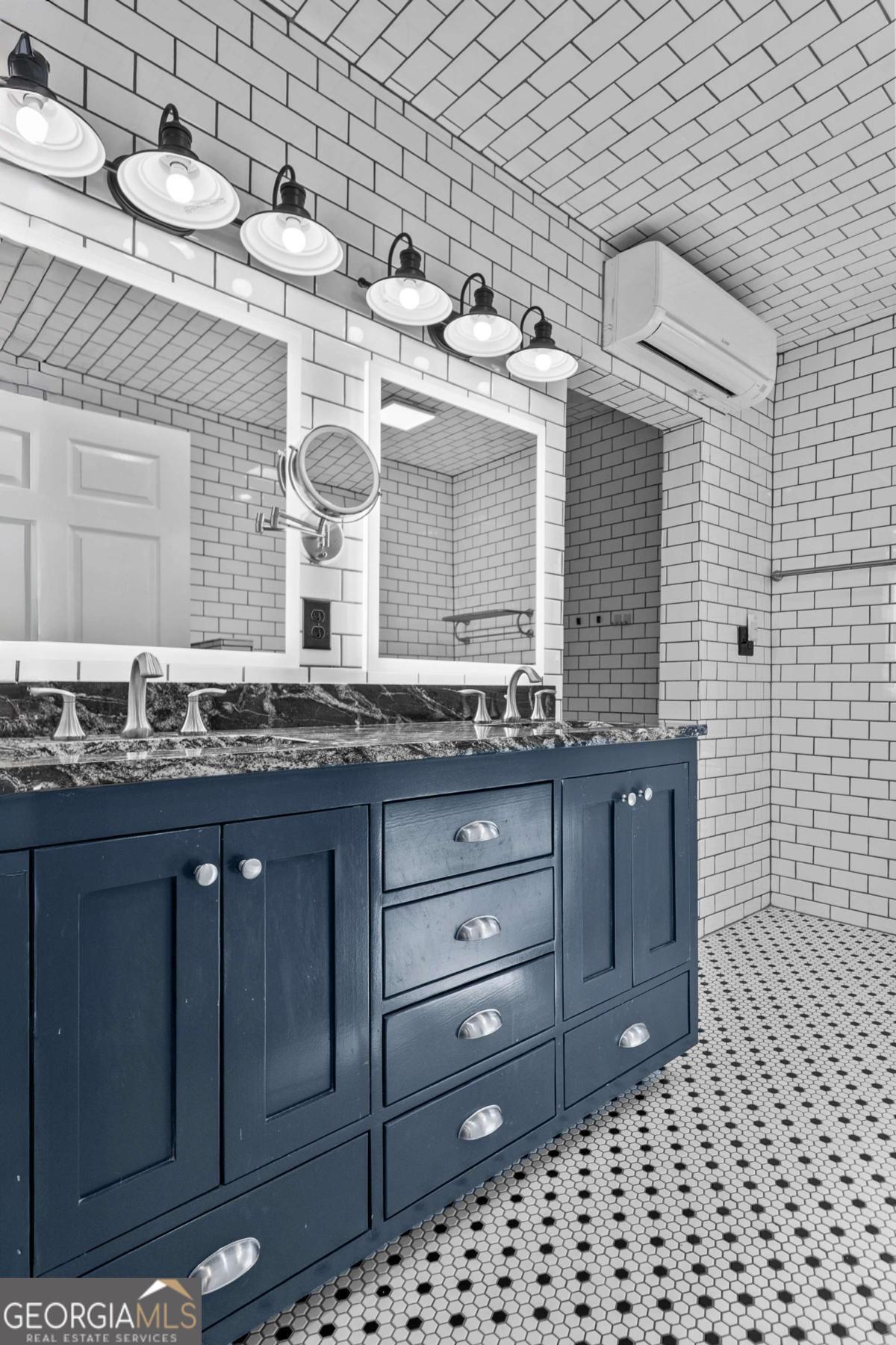 140 Jack Road Fitzgerald, GA 31750 - Photo 28 of 55 a bathroom with a sink a vanity and a mirror