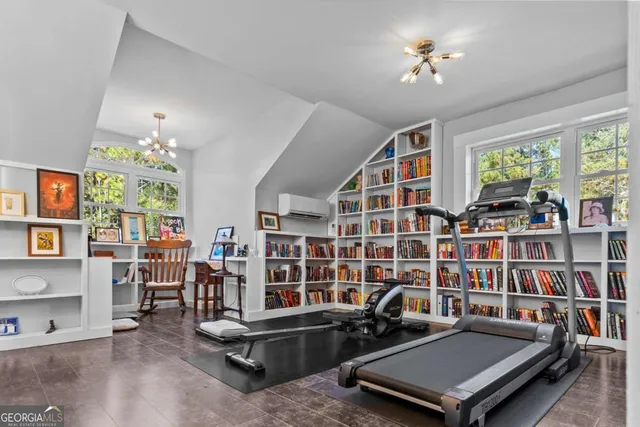 a view of a backyard with a tree