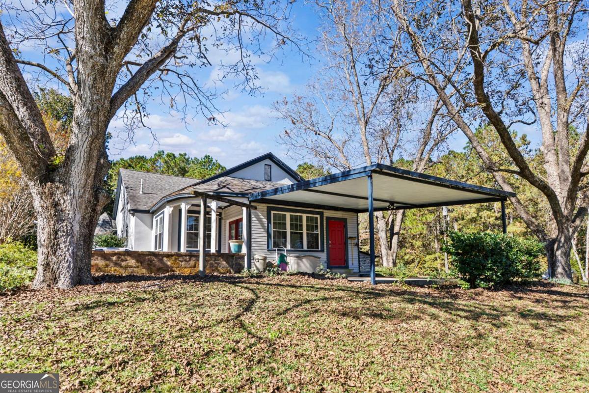 140 Jack Road Fitzgerald, GA 31750 - Photo 43 of 55 a view of a house with a yard and tree s