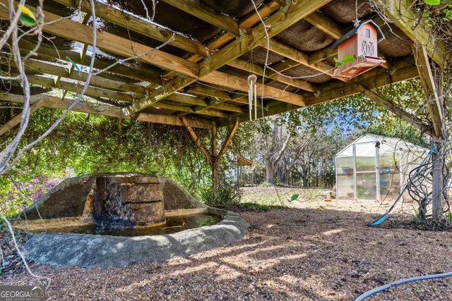 a aerial view of a house with a yard