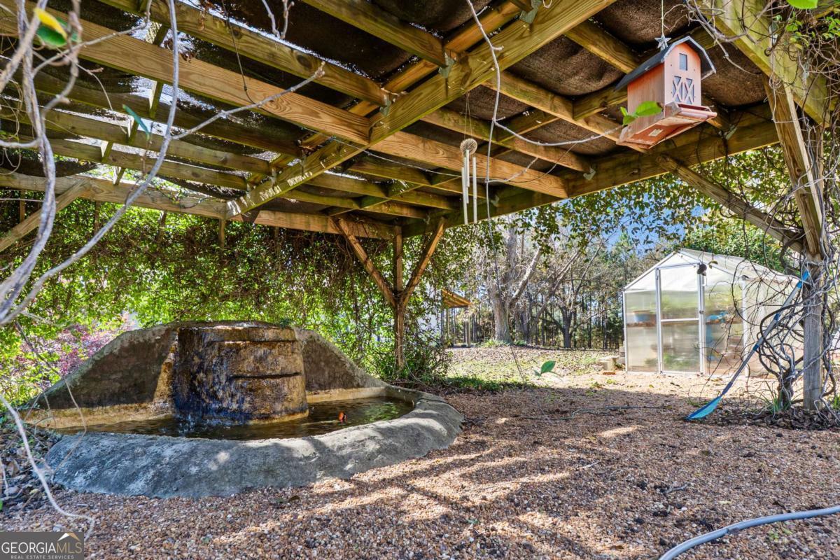140 Jack Road Fitzgerald, GA 31750 - Photo 44 of 55 a view of a dry yard with large tree