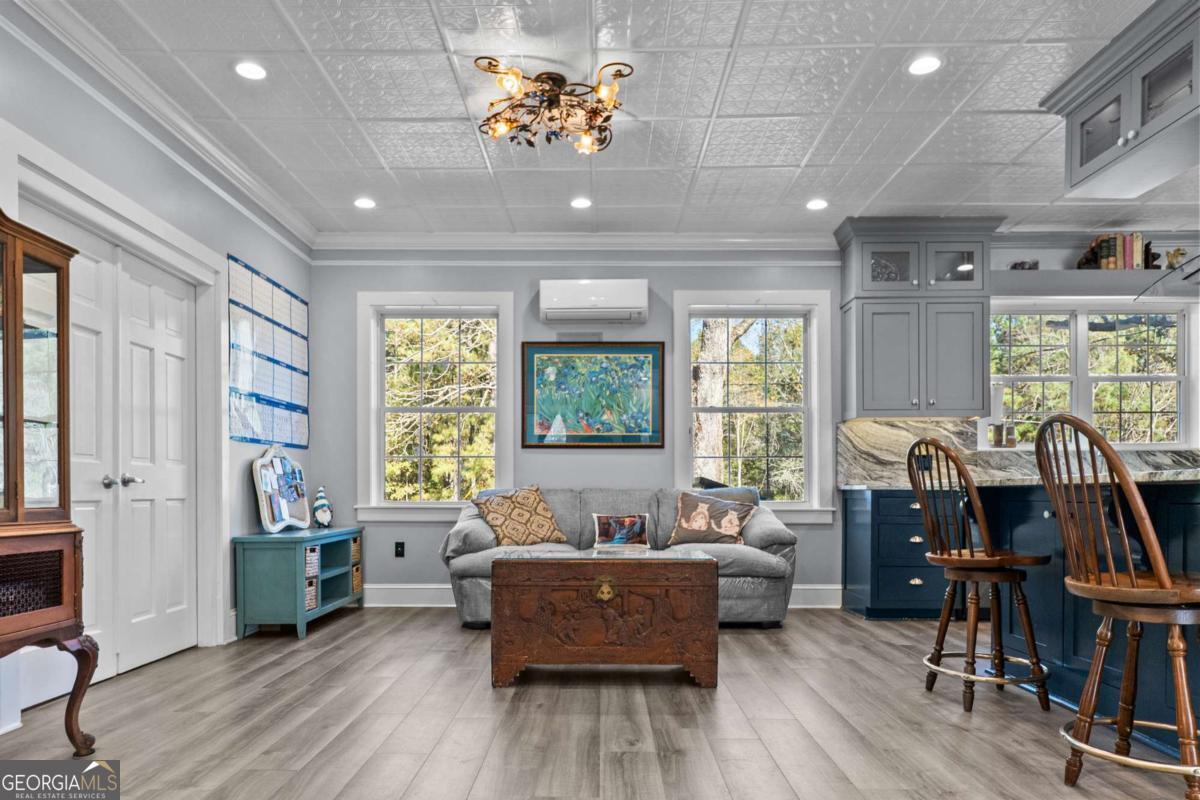 140 Jack Road Fitzgerald, GA 31750 - Photo 9 of 55 a living room with furniture and a wooden floor
