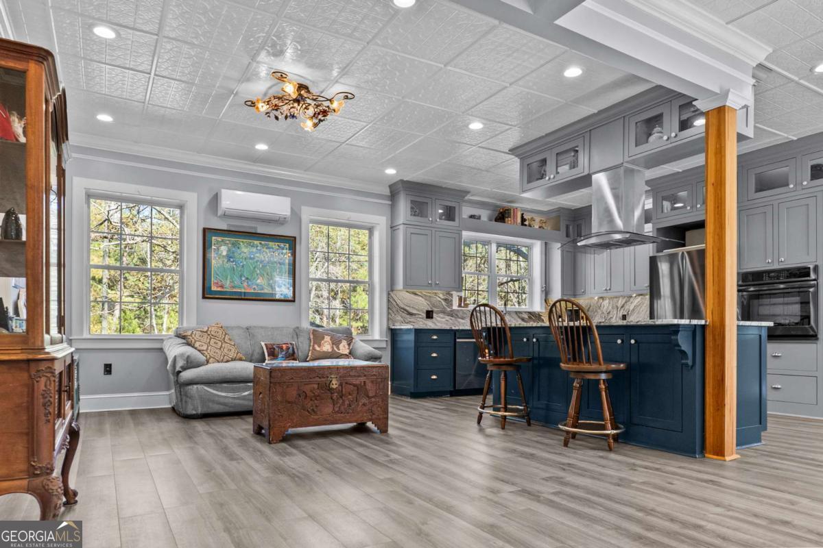 140 Jack Road Fitzgerald, GA 31750 - Photo 10 of 55 a living room with furniture and wooden floor