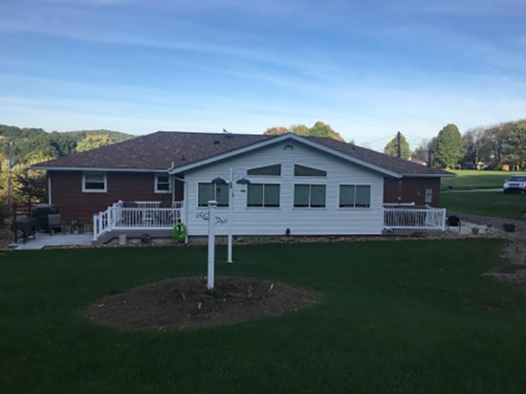 818 Barclay Road Indiana, PA 15701 - Photo 2 of 15 a front view of a house with a yard fire pit and outdoor seating