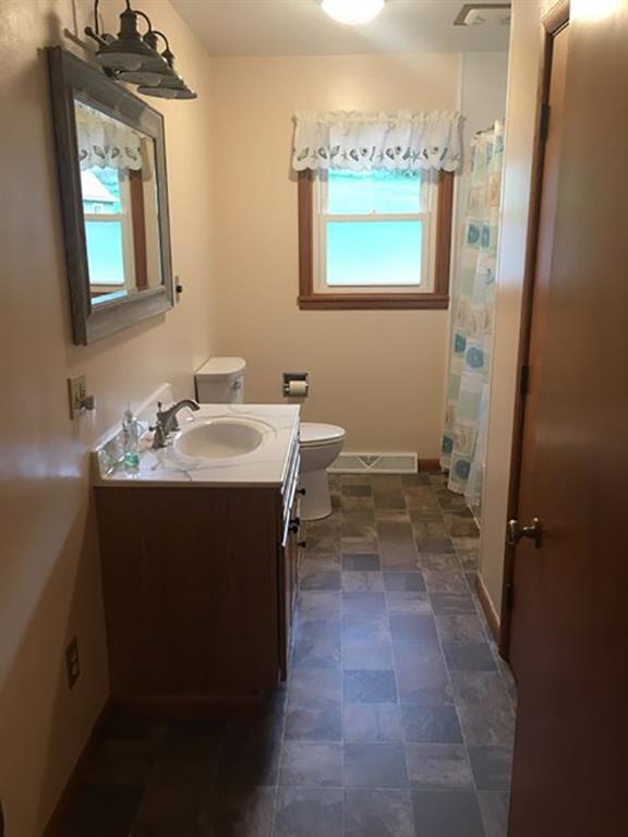 818 Barclay Road Indiana, PA 15701 - Photo 7 of 15 a bathroom with a sink a toilet and a mirror
