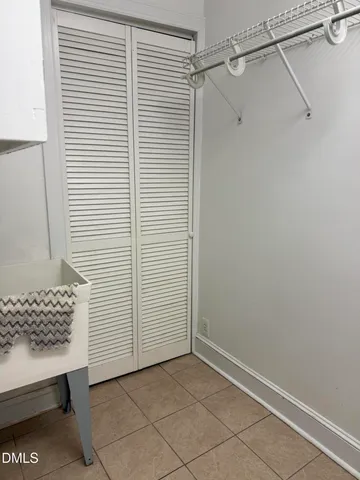 a view of room with walk in closet