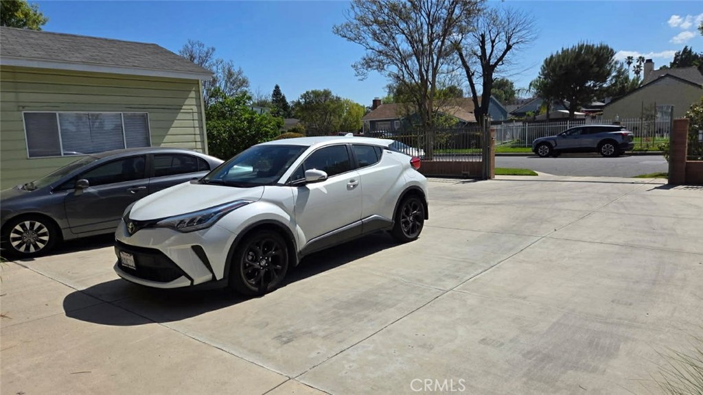 19843 Enadia Way, Unit RISE Winnetka, CA 91306 - Photo 1 of 20 a view of a back yard of the house