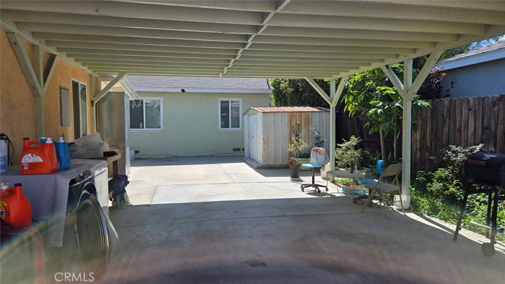 19843 Enadia Way, Unit RISE Winnetka, CA 91306 - Photo 14 of 20 a house with potted plants in front of it