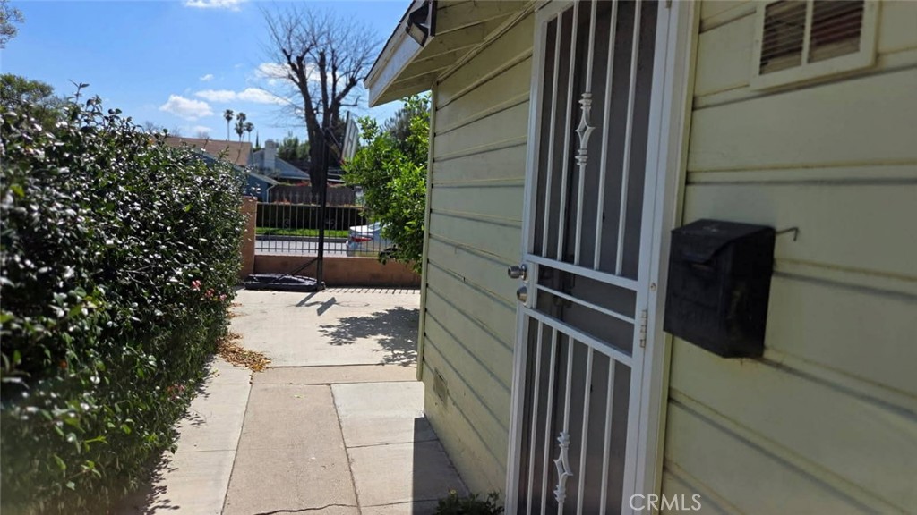 19843 Enadia Way, Unit RISE Winnetka, CA 91306 - Photo 7 of 20 a view of a pathway of a house