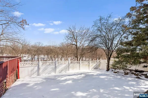 a view of a outdoor space yard and trees