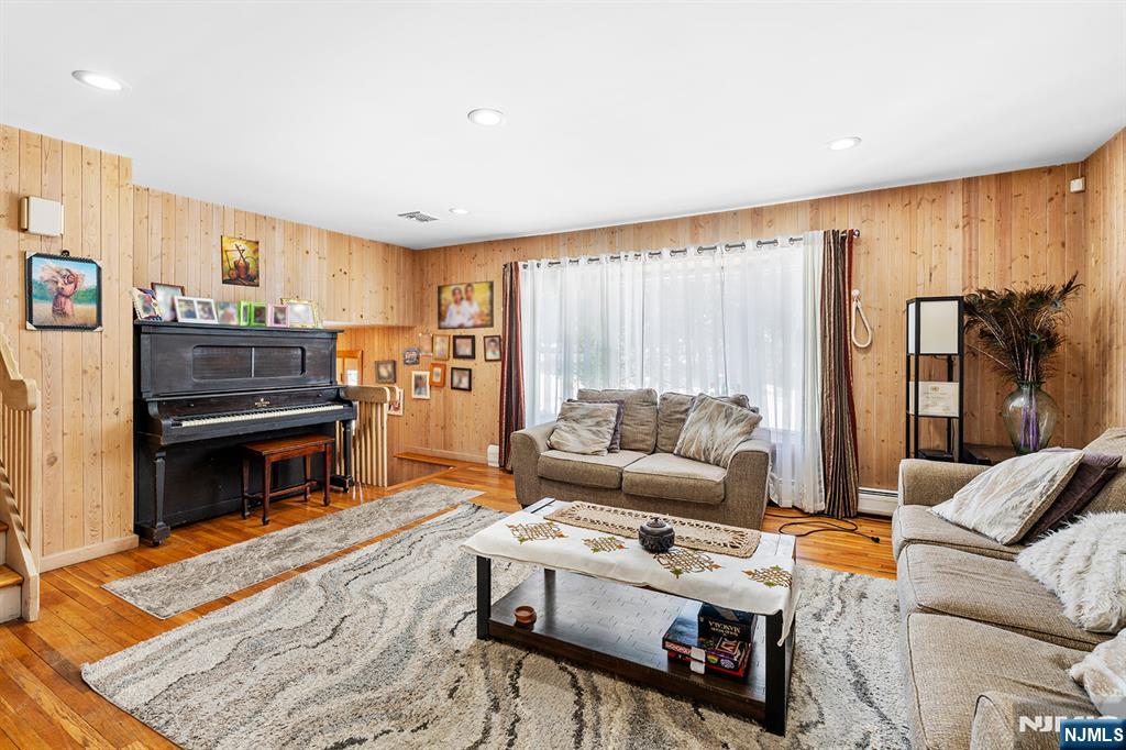406 Kinderkamack Road River Edge, NJ 07661 - Photo 4 of 18 a living room with furniture and a wooden floor