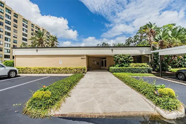 a view of a swimming pool with a lounge chair