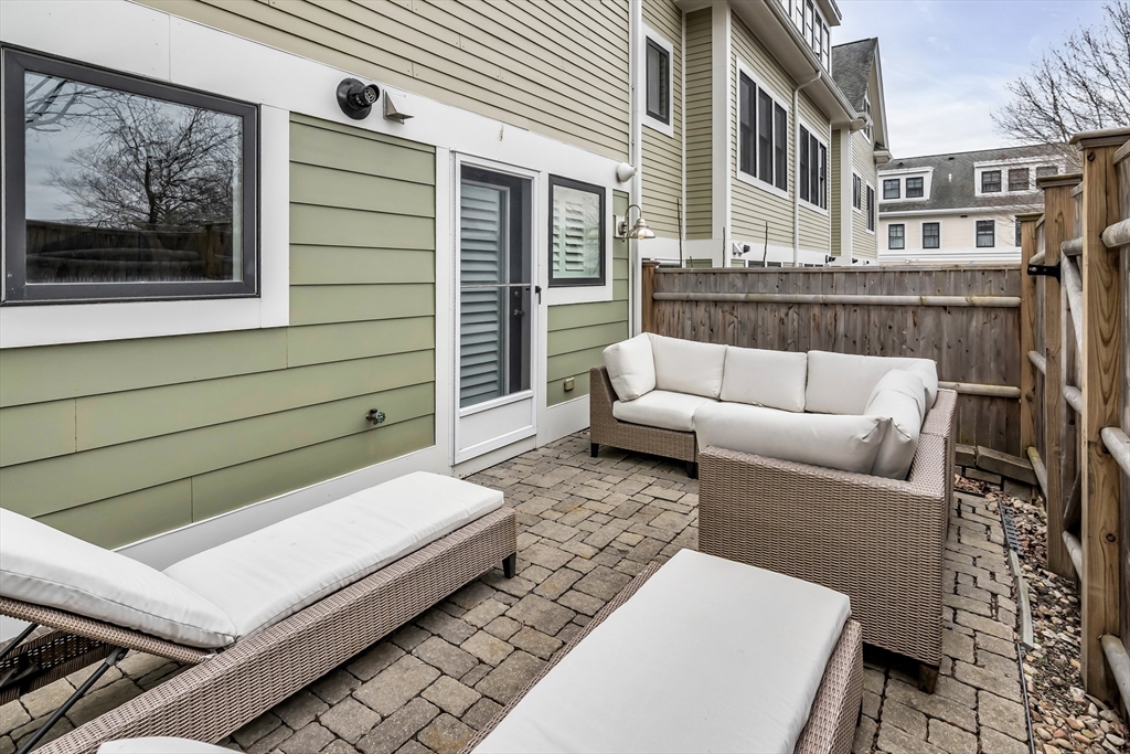 6 Summer Street, Unit D Manchester, MA 01944 - Photo 30 of 31 a building outdoor space with patio furniture