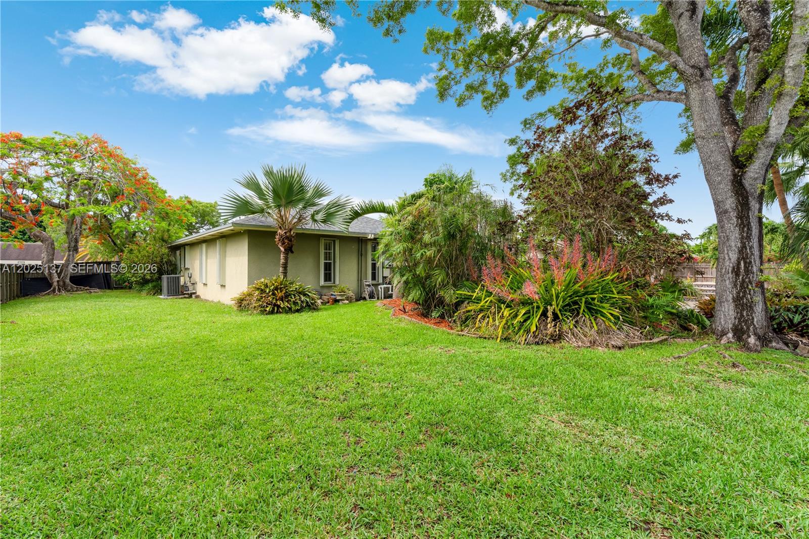 11480 Southwest 96th Terrace Miami, FL 33176 - Photo 54 of 54 a view of a house with backyard and garden