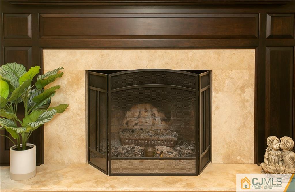 36 Pine Ridge Drive Edison, NJ 08820 - Photo 19 of 51 a closeup of a potted plant sitting on a shelf