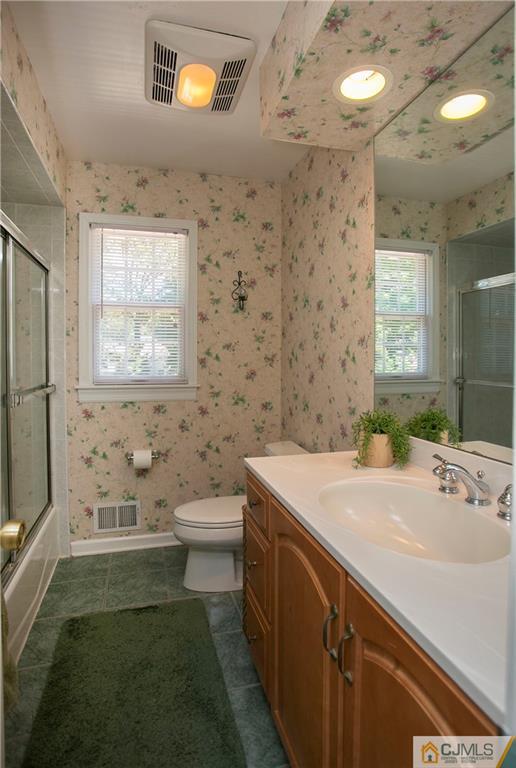 36 Pine Ridge Drive Edison, NJ 08820 - Photo 26 of 51 a bathroom with a sink a toilet and shower