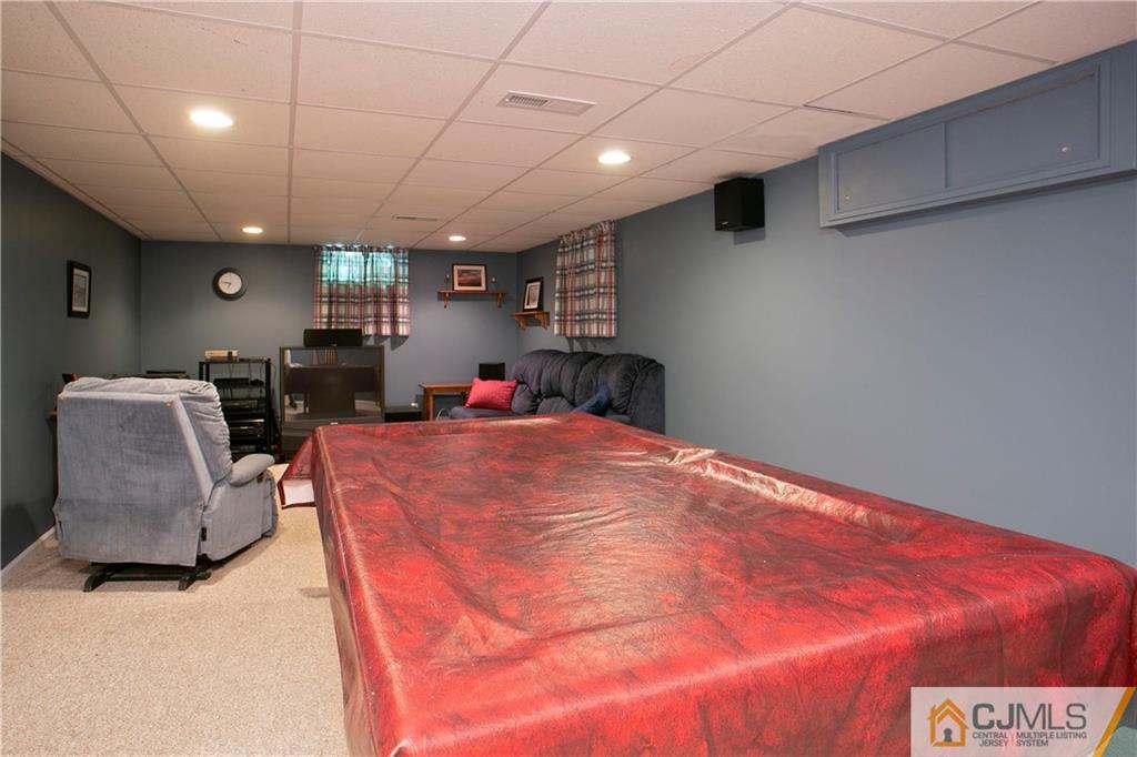 36 Pine Ridge Drive Edison, NJ 08820 - Photo 32 of 51 a very nice looking room with a large bed