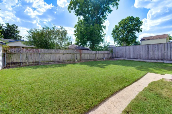 a view of a backyard with a garden