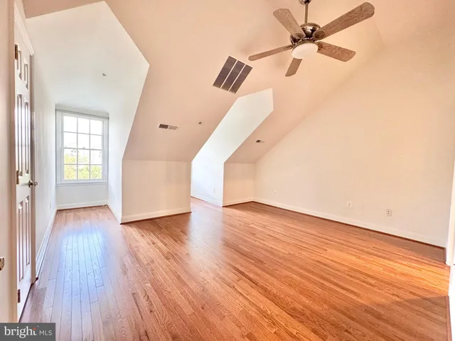 a bathroom with a sink toilet and mirror