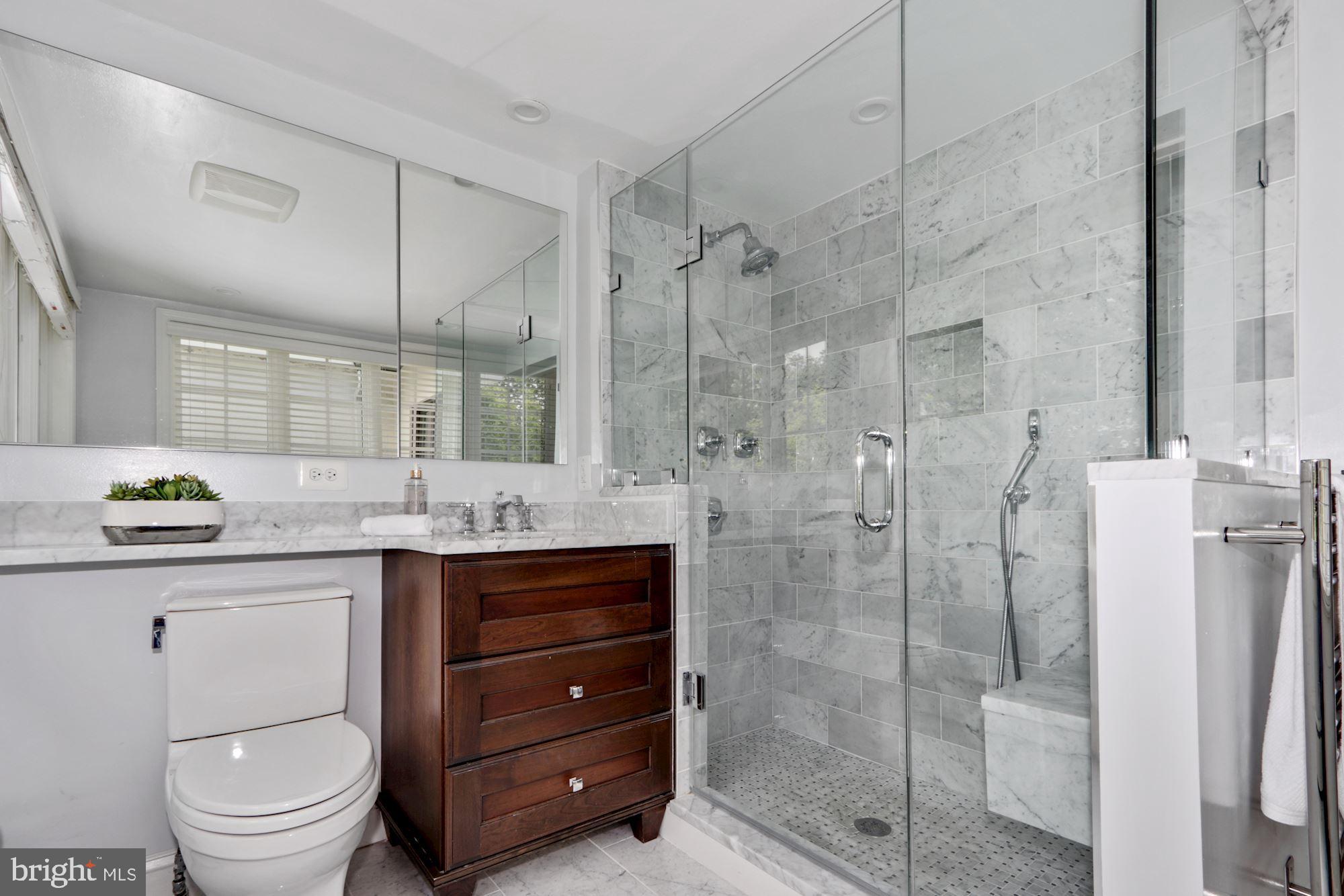 3212 Klingle Road Northwest Washington, DC 20008 - Photo 17 of 35 Primary Bathroom with Heated Floors and Towel Bar