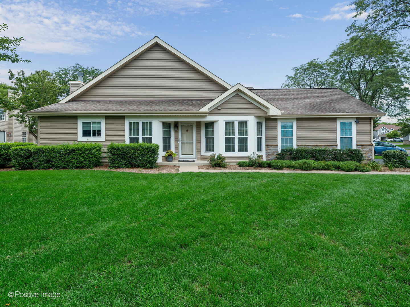 1334 Ridgefield Circle Carol Stream, IL 60188 - Photo 1 of 16 a front view of house with yard and green space