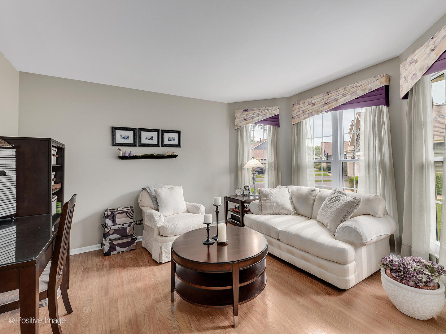 1334 Ridgefield Circle Carol Stream, IL 60188 - Photo 3 of 16 a living room with furniture and a large window