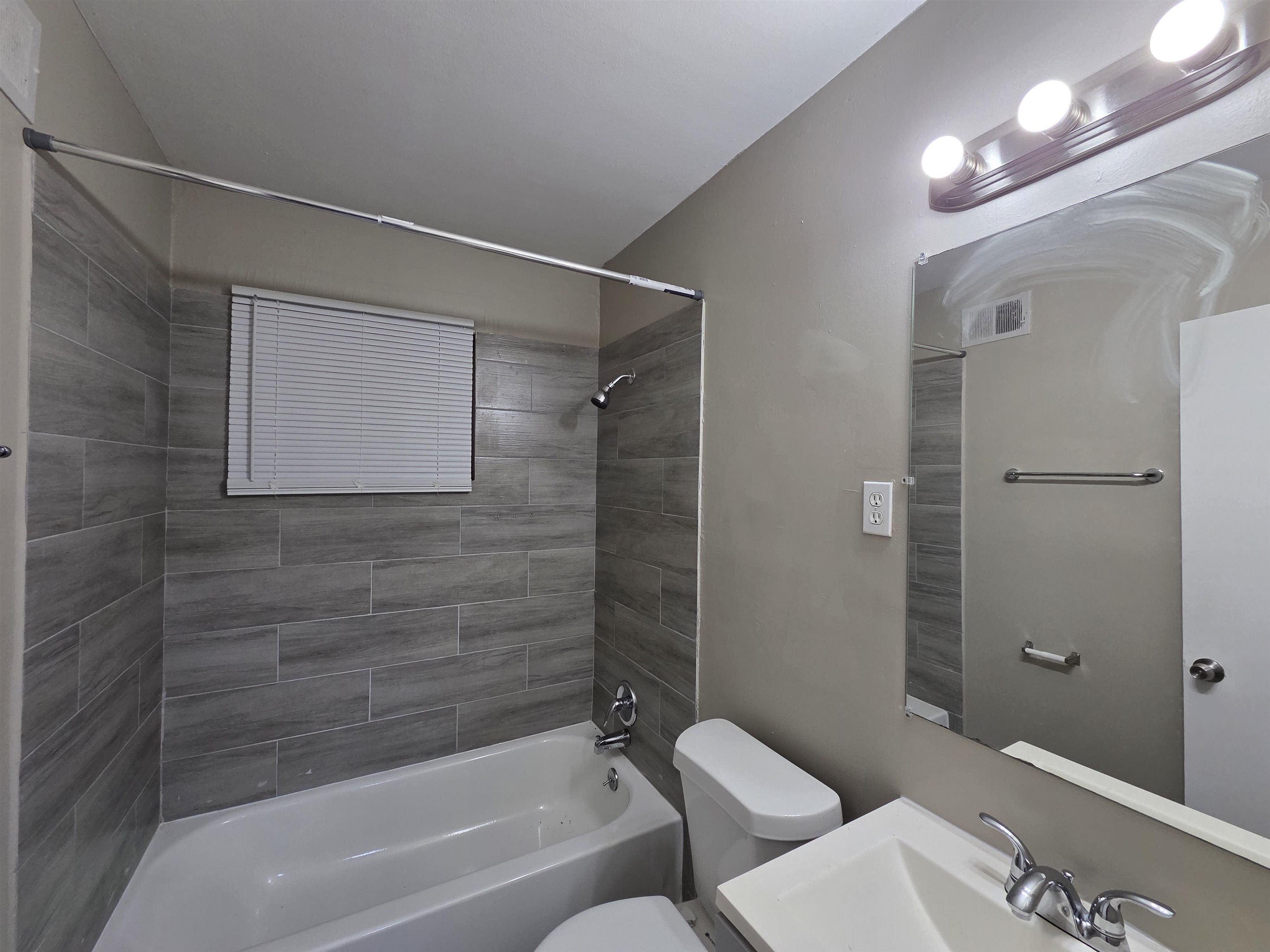 3602 Gowan Drive Memphis, TN 38127 - Photo 17 of 20 a bathroom with a toilet and a shower