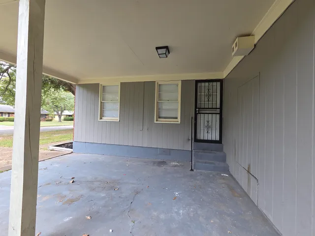 an empty room with windows