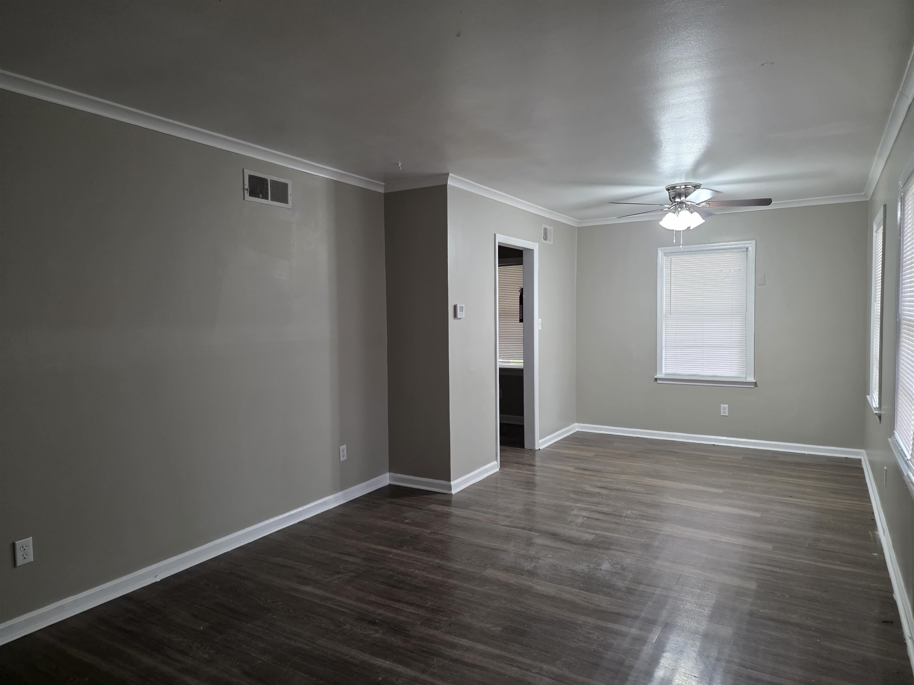 3602 Gowan Drive Memphis, TN 38127 - Photo 4 of 20 a view of an empty room with wooden floor