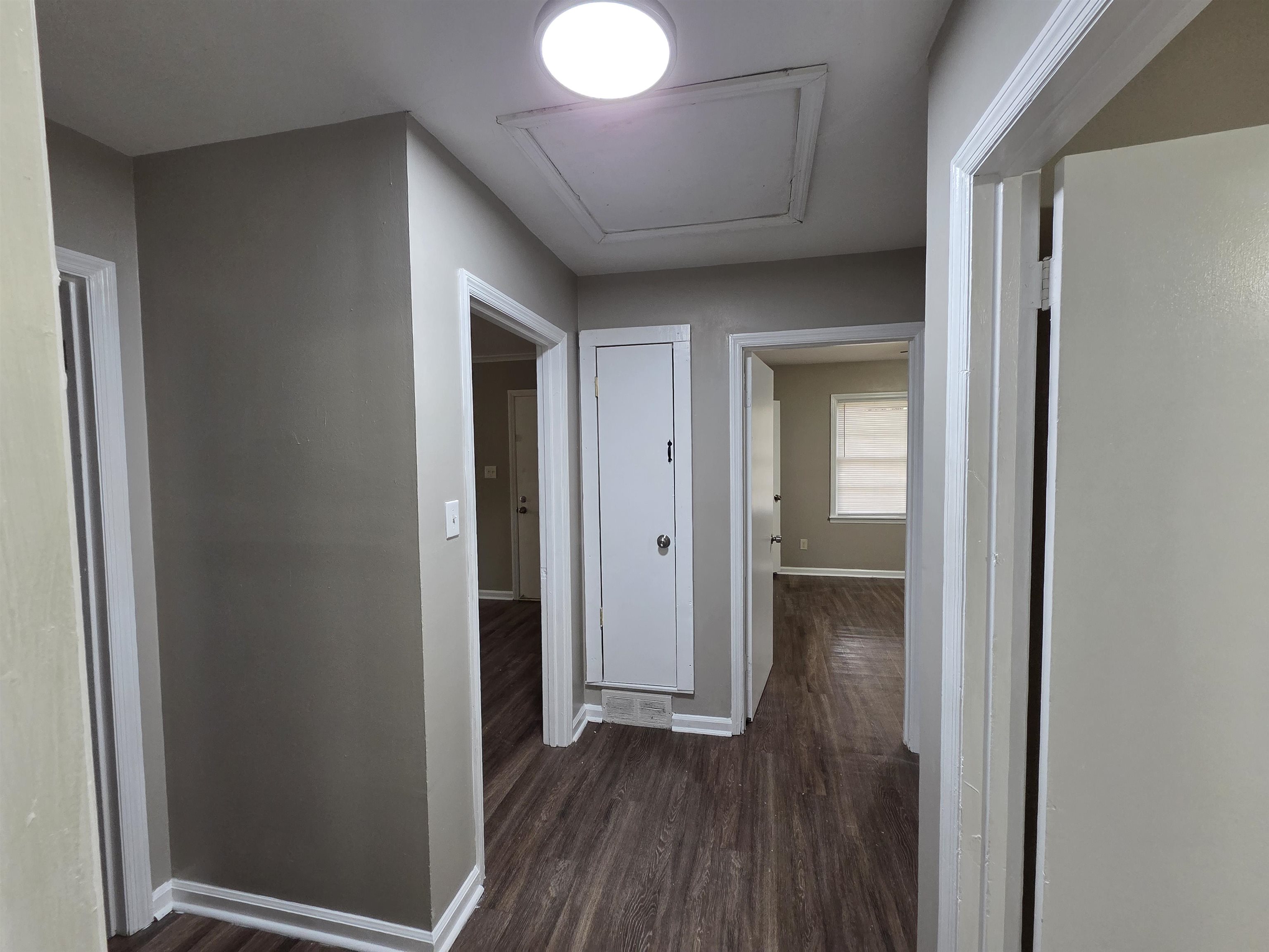 3602 Gowan Drive Memphis, TN 38127 - Photo 9 of 20 a view of a hallway with wooden floor