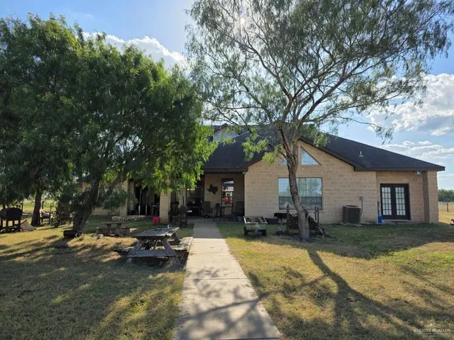 a view of a house with a patio