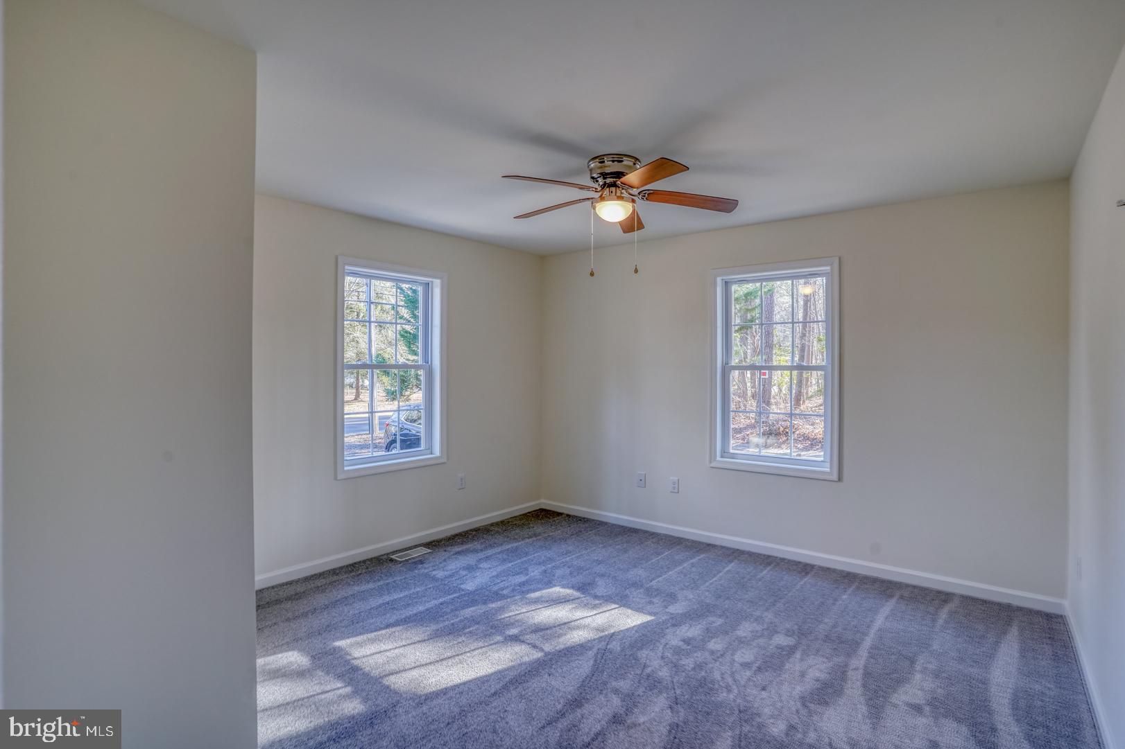 4366 Deep Grass Lane Houston, DE 19954 - Photo 19 of 28 a view of an empty room with a window