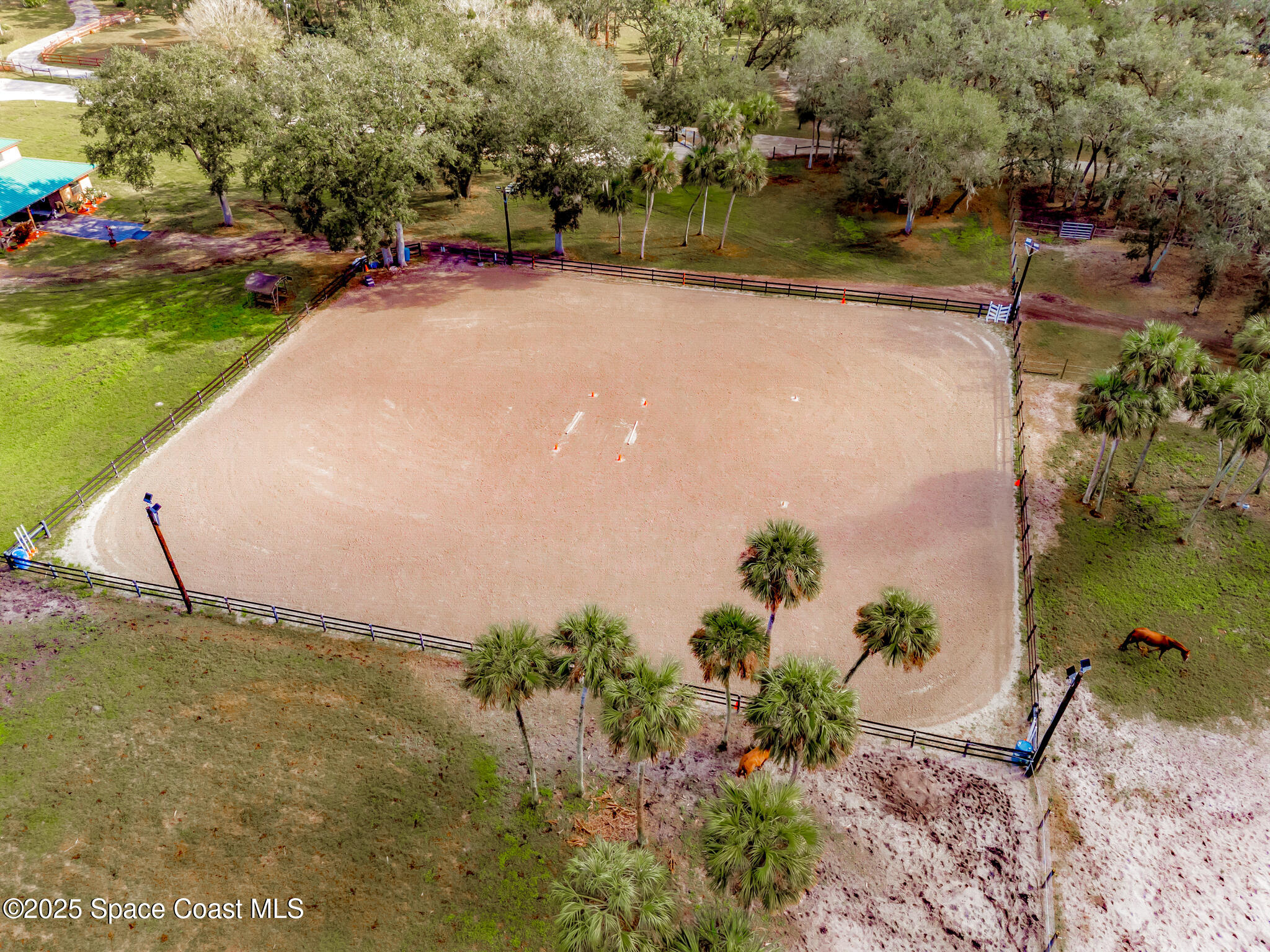4630 James Road Cocoa, FL 32926 - Photo 14 of 58 an aerial view of a house with a yard and lake view