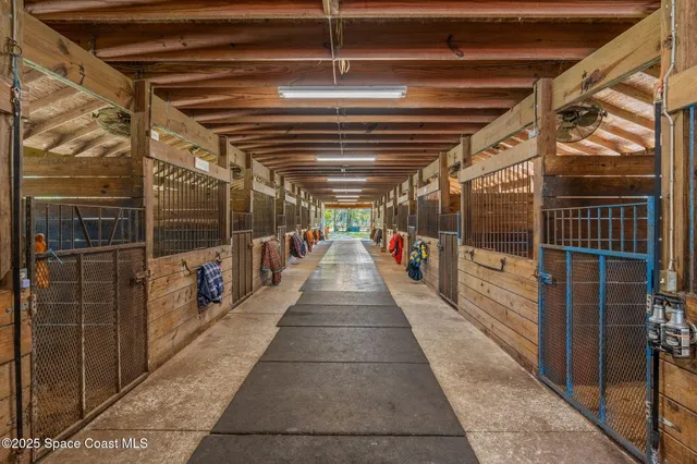 a view of a garage with table and chairs