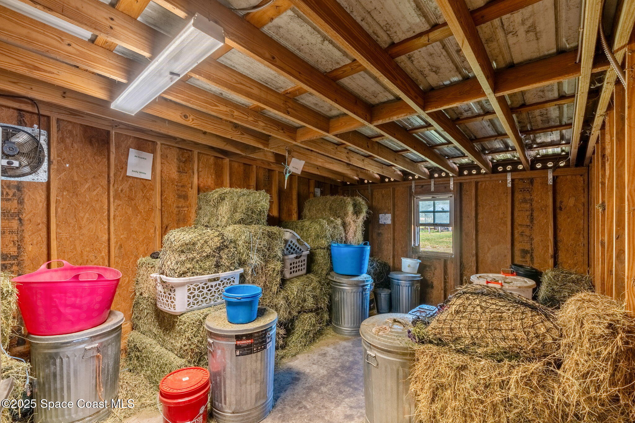 4630 James Road Cocoa, FL 32926 - Photo 30 of 58 a living room with furniture and a wooden floor
