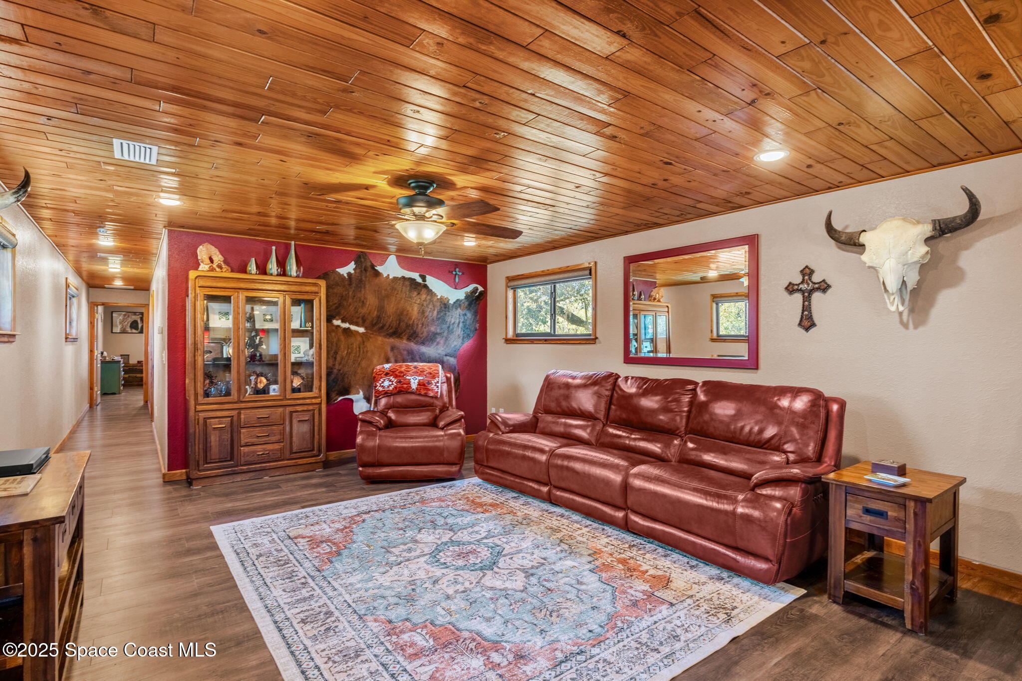 4630 James Road Cocoa, FL 32926 - Photo 32 of 58 a living room with furniture and a flat screen tv
