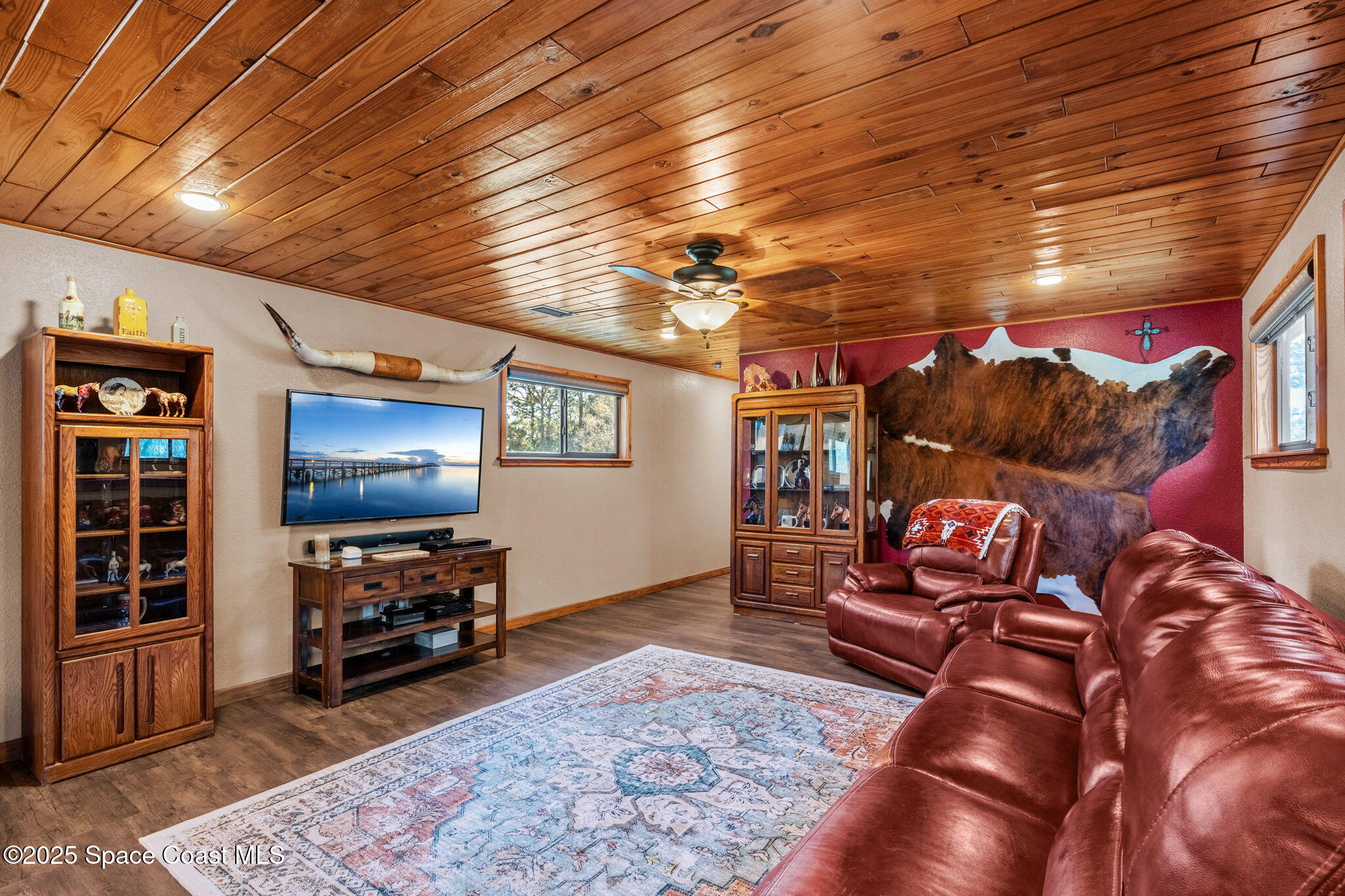 4630 James Road Cocoa, FL 32926 - Photo 33 of 58 a view of a livingroom with furniture and a flat screen tv
