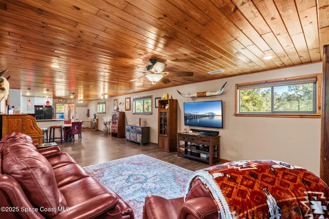 a bathroom with a sink a mirror and a toilet