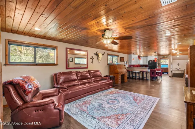 a bedroom with furniture and window