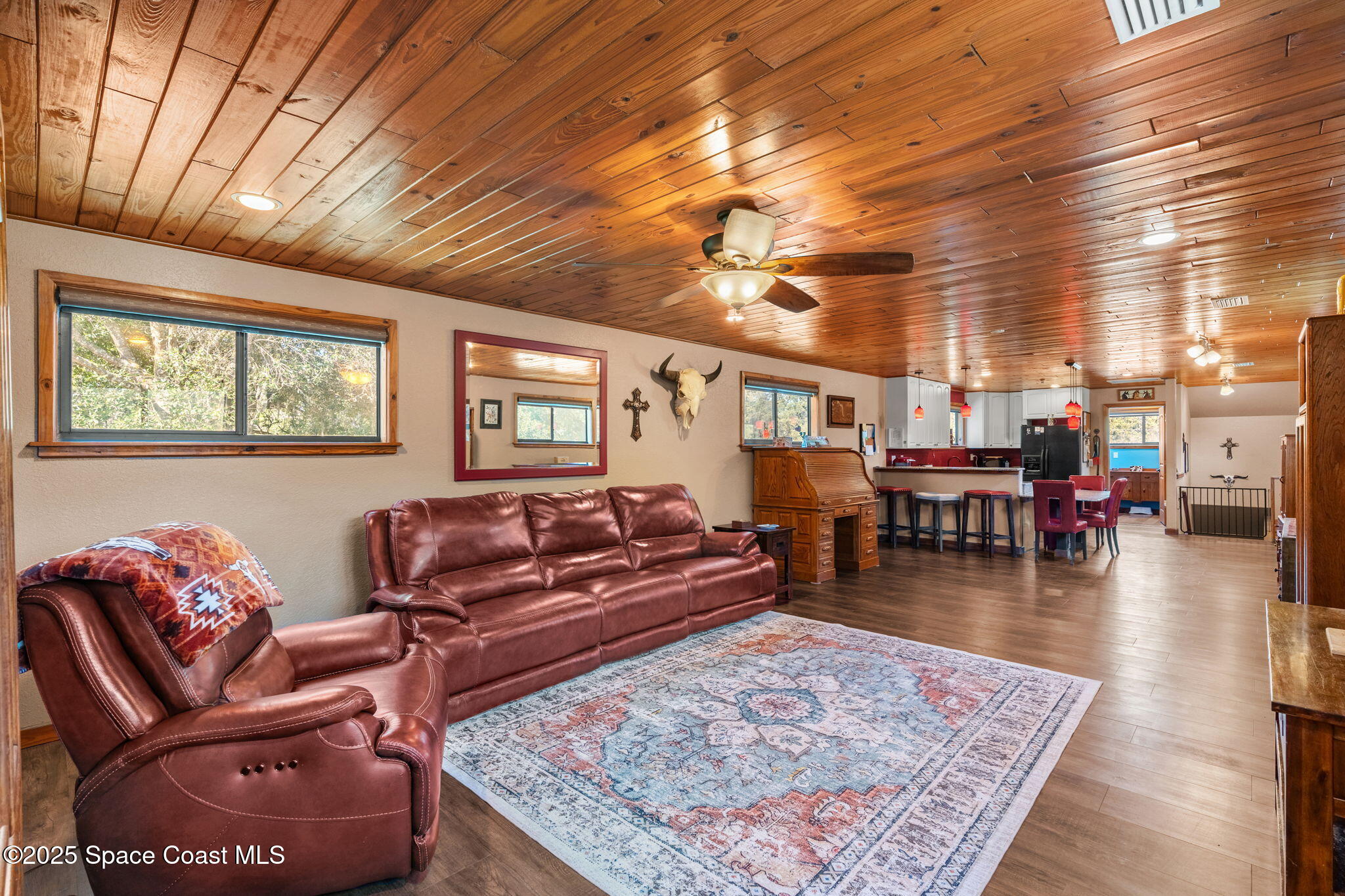 4630 James Road Cocoa, FL 32926 - Photo 35 of 58 a living room with furniture and a wooden floor